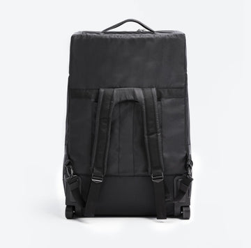 Back side view of the Roam Padded Roller Backpack with the straps pulled out